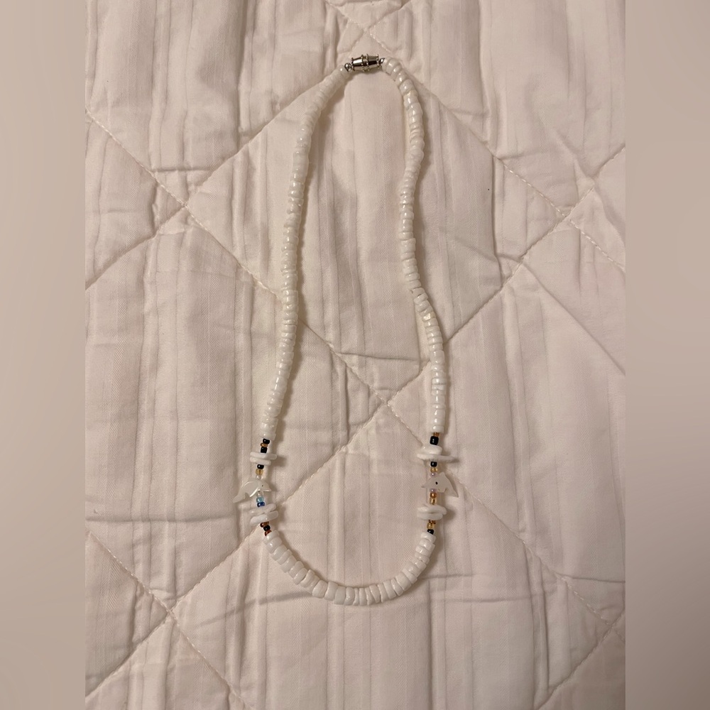 Dolphin Puka Shell Necklace